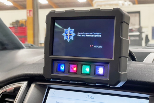 Touch Screen Handset mounted on dashboard showing County Durham and Darlington Fire and Rescue Service logo with various buttons