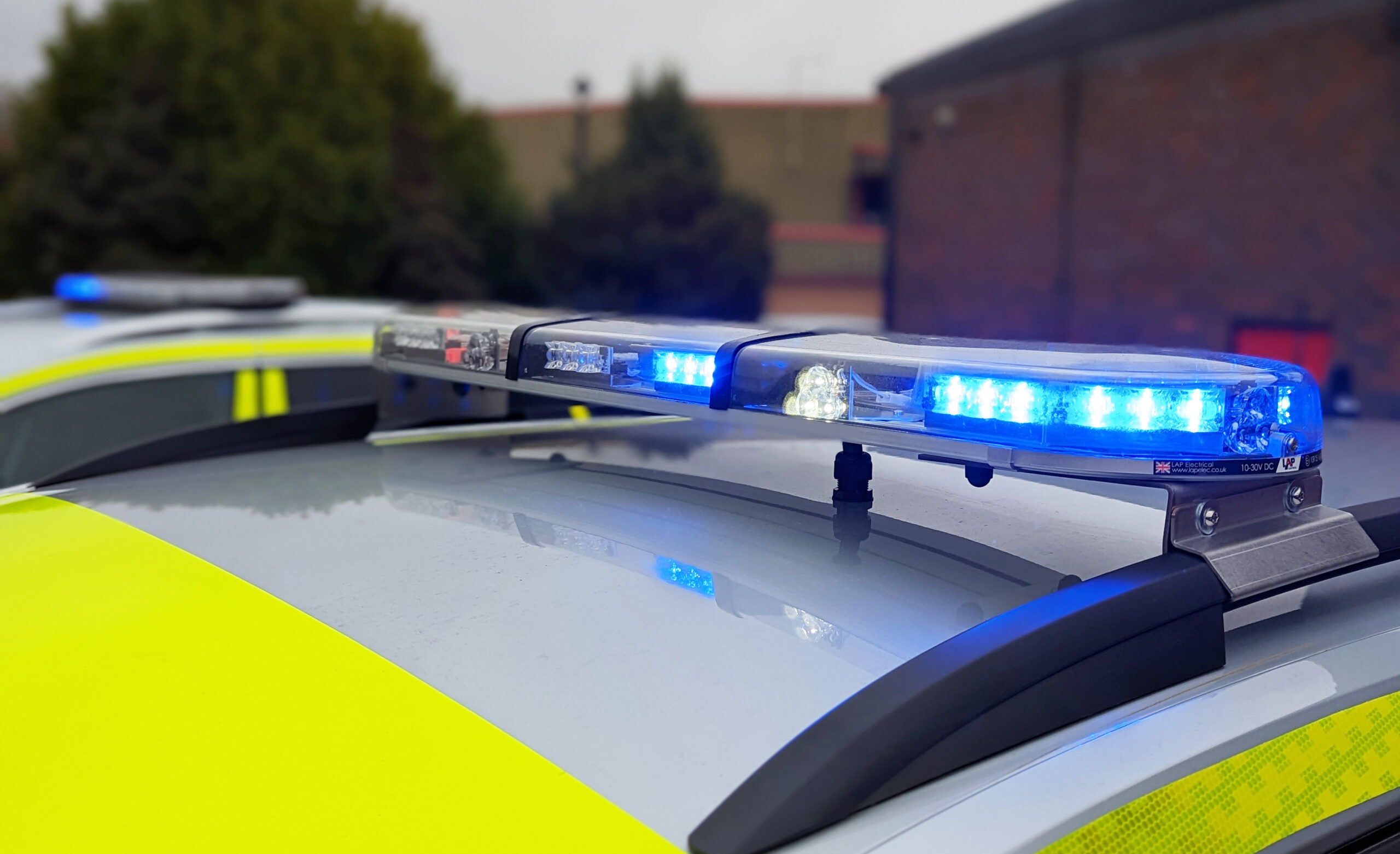 Lightbar Close up on Emergency Response Vehicle Roof, Second Lightbar out of focus in Background