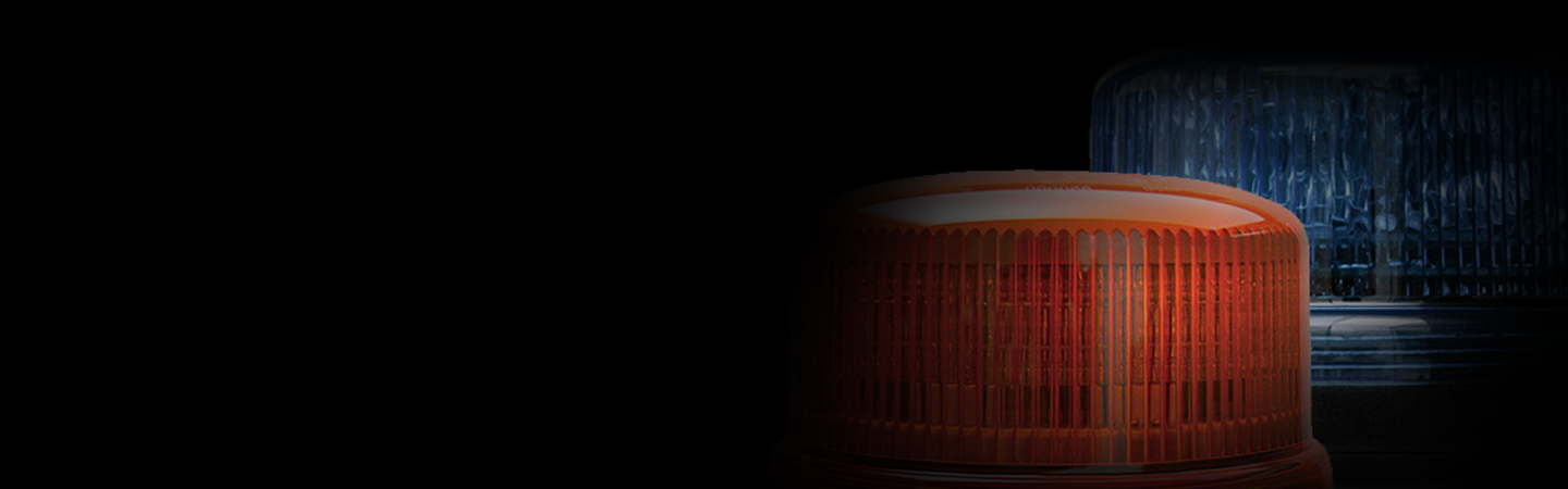 Amber and Blue Unlit Beacons on Right Hand Side Blending in from Black