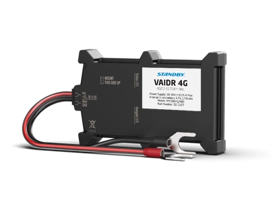 Vaidr FleetMotus Telematics device at an angle on a white background with a dropshadow underneath. Black and red wires protrude from the lefthand side and loop around the front of the device with metal U-Shaped connectors on the end.