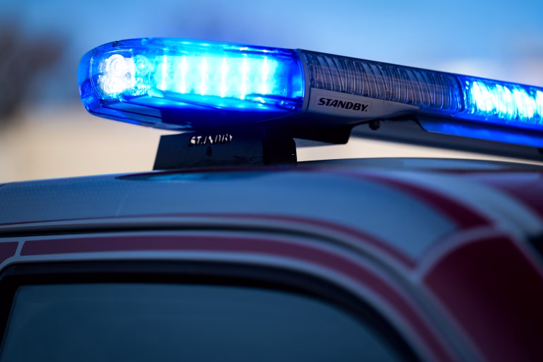 Standby W3 Blue Lightbar closely cropped on a vehicle roof.