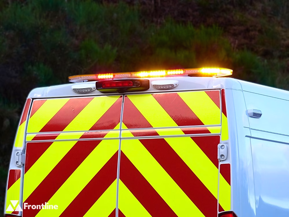 Raiden Lightbar with amber and red LEDs shown on the roof of a white Peugeot Boxer with reflective chevrons on the back doors.