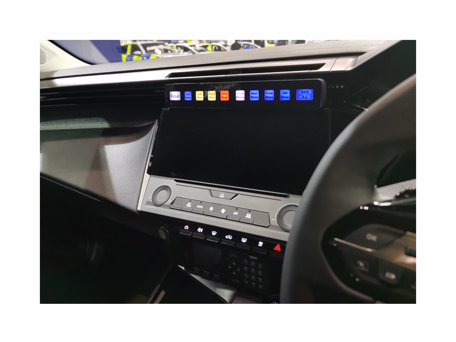 UNI-SLD-XXX MCS-F5D Slimline Switch Unit in situ on vehicle dashboard at angle